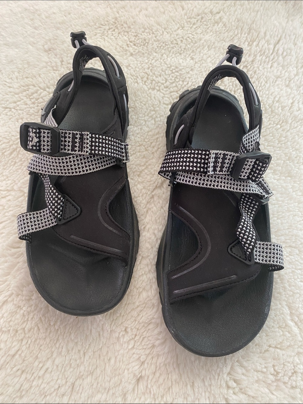 Nike Black Sandals with Black-and-White Webbing Straps